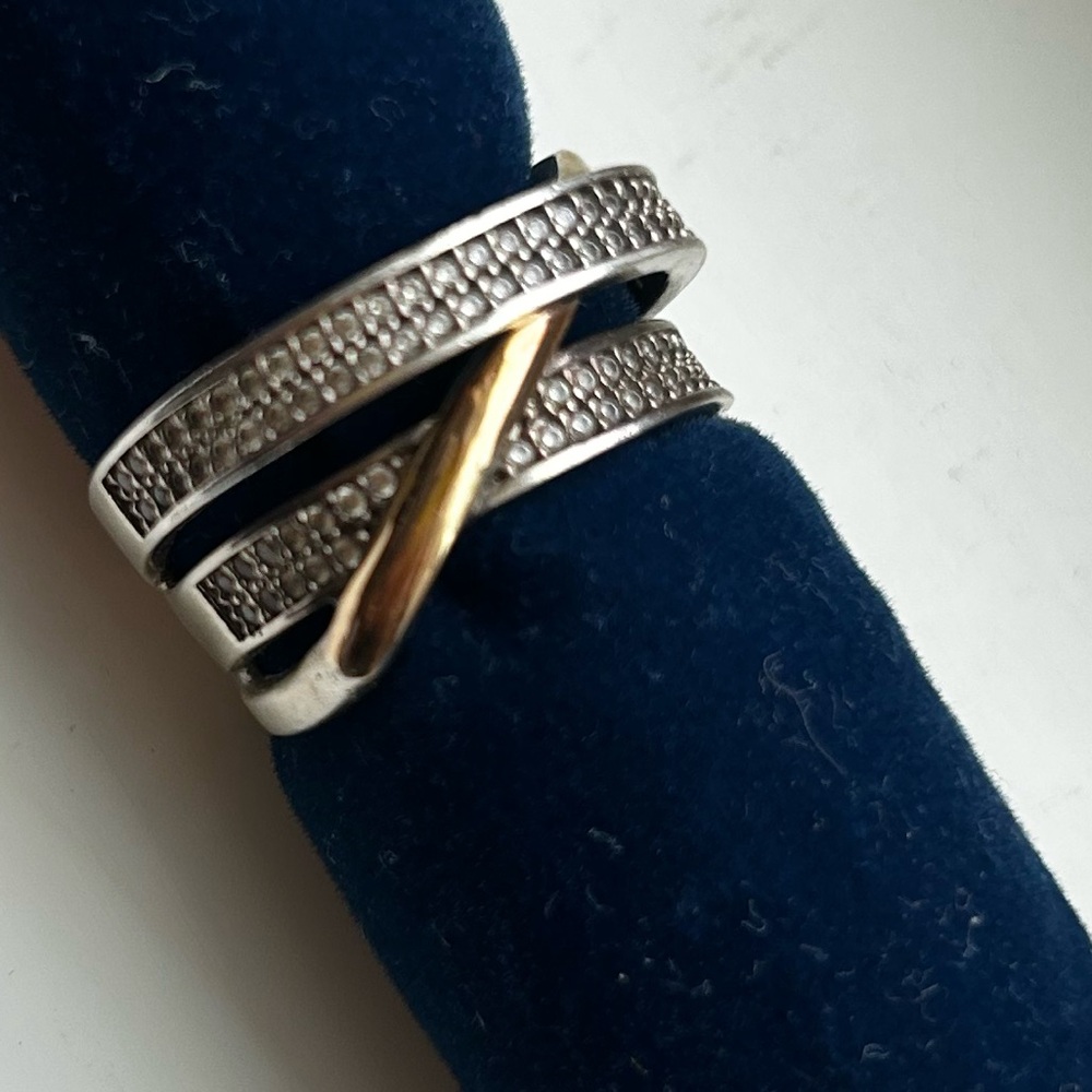 New ring of 925 rhodium-plated sterling silver and 18-carat gold with zircons